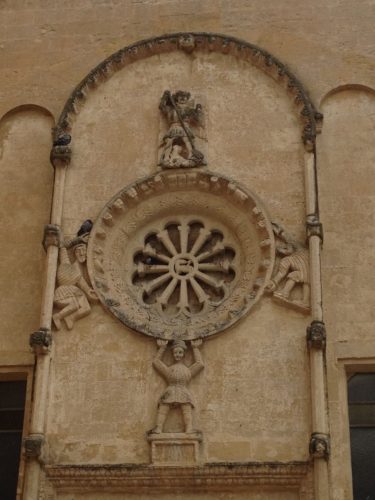 The Wheel of Fortune on the church facade of St Domenico in Matera - Italy